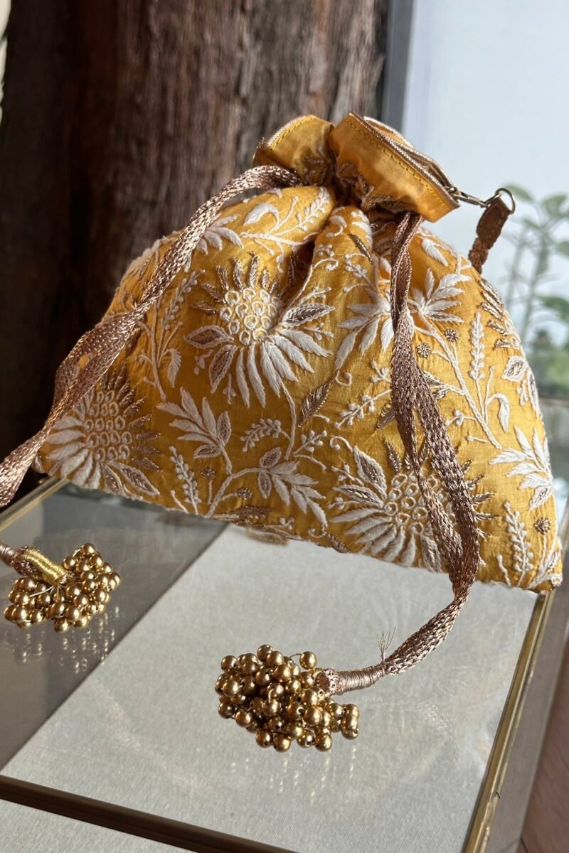 Yellow Handcrafted Silk Chikankari Potli Bags With Ari Work