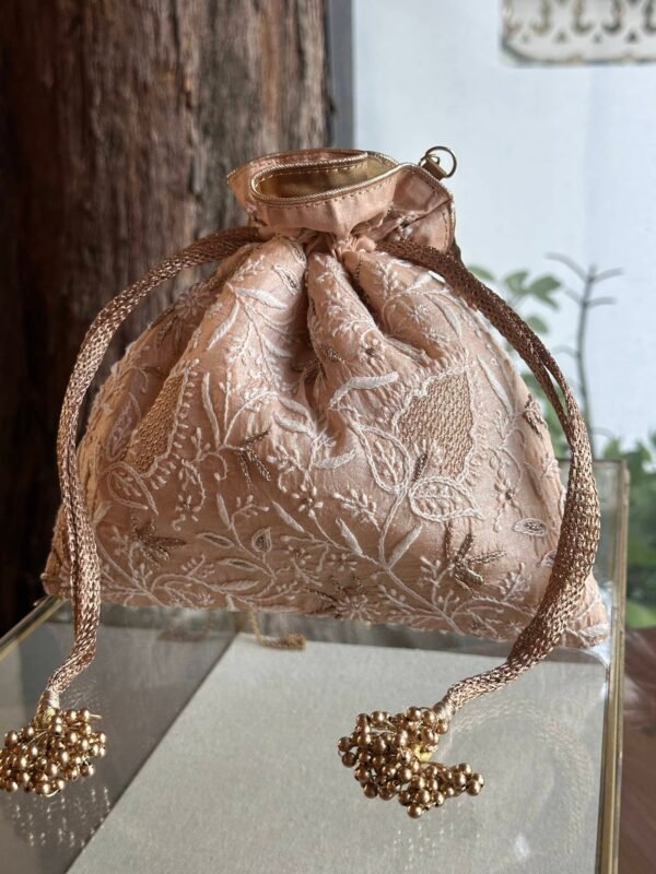 Pink Handcrafted Silk Chikankari Potli Bags With Ari Work