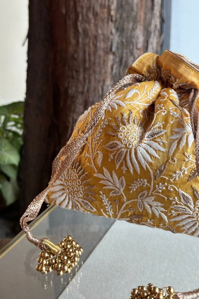 Yellow Handcrafted Silk Chikankari Potli Bags With Ari Work