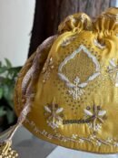Yellow Handcrafted Silk Chikankari Potli Bags With Ari Work and Mukaish Kamdani
