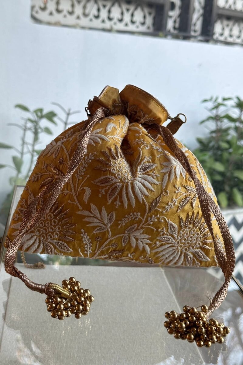 Yellow Handcrafted Silk Chikankari Potli Bags With Ari Work