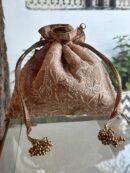 Pink Handcrafted Silk Chikankari Potli Bags With Ari Work