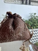 Brown Handcrafted Silk Chikankari Potli Bags With Ari Work