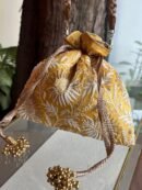 Yellow Handcrafted Silk Chikankari Potli Bags With Ari Work